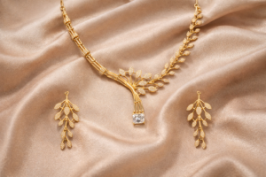 Arira Golden Finish Anti Tarnish White Stone American Diamond Elegant Necklace with Earrings.