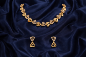 Arira Gold Finish Elegant and Stylish Anti Tarnish American Diamond Necklace with Earrings
